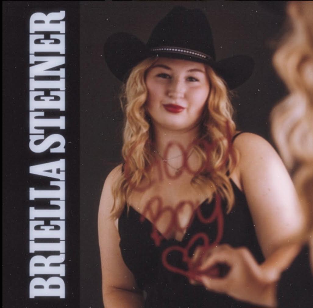 Portrait of Briella Steiner wearing a cowboy hat
